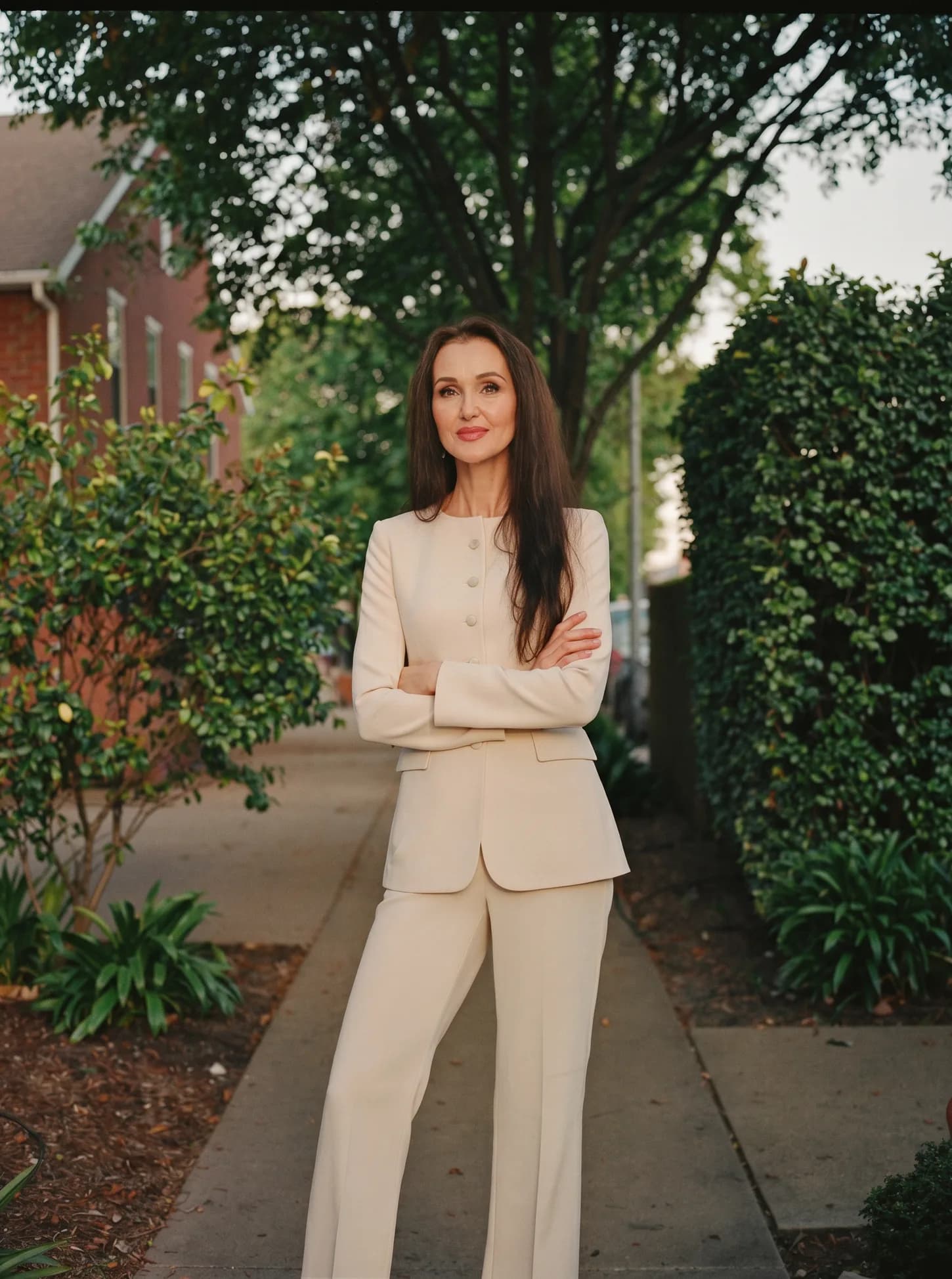 Nataliya Hennings on a tree-lined Kansas City sidewalk